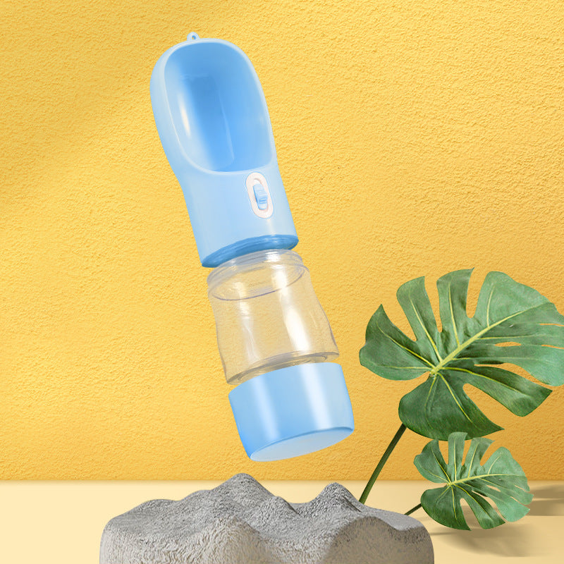 Portable blue pet dog water bottle with built-in drinking bowl for outdoor use