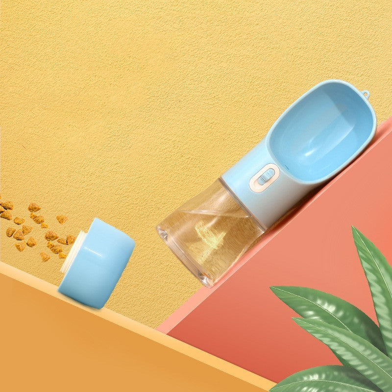 Portable blue pet dog water bottle with built-in drinking bowl and food container for outdoor travel
